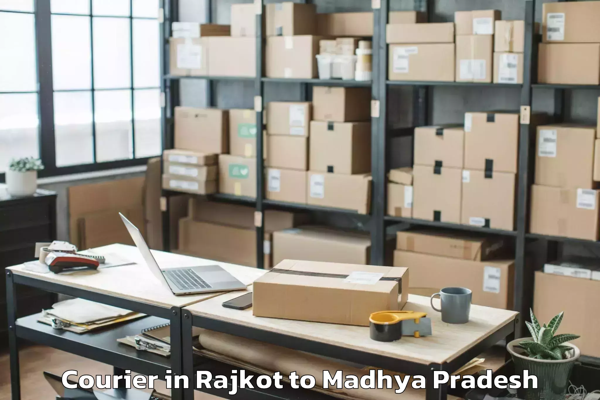 Book Rajkot to Garh Courier Online